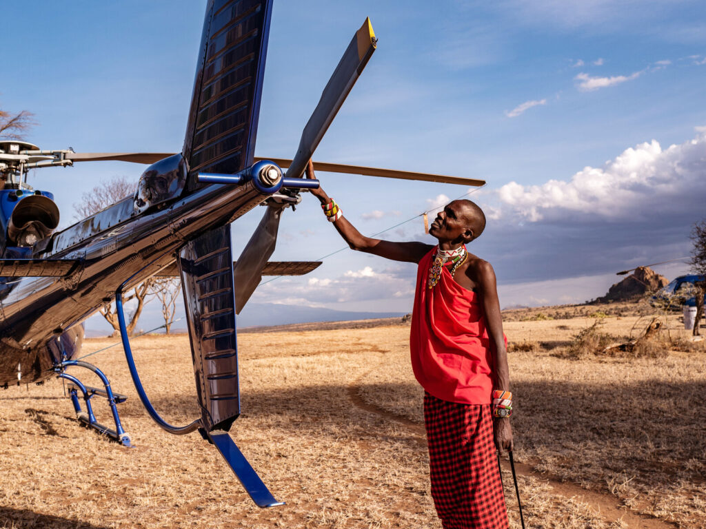 Maasai with helicopter