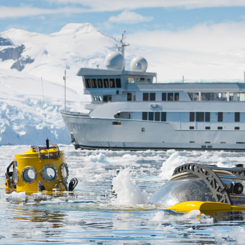 Submersibles in Antarctica with SuRi superyacht in the background