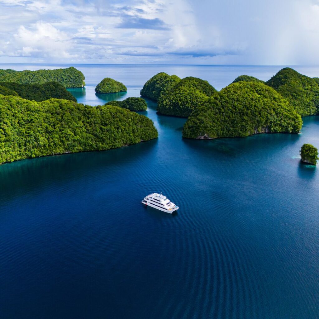 Drone shot of Four Seasons Explorer yacht in Palau.