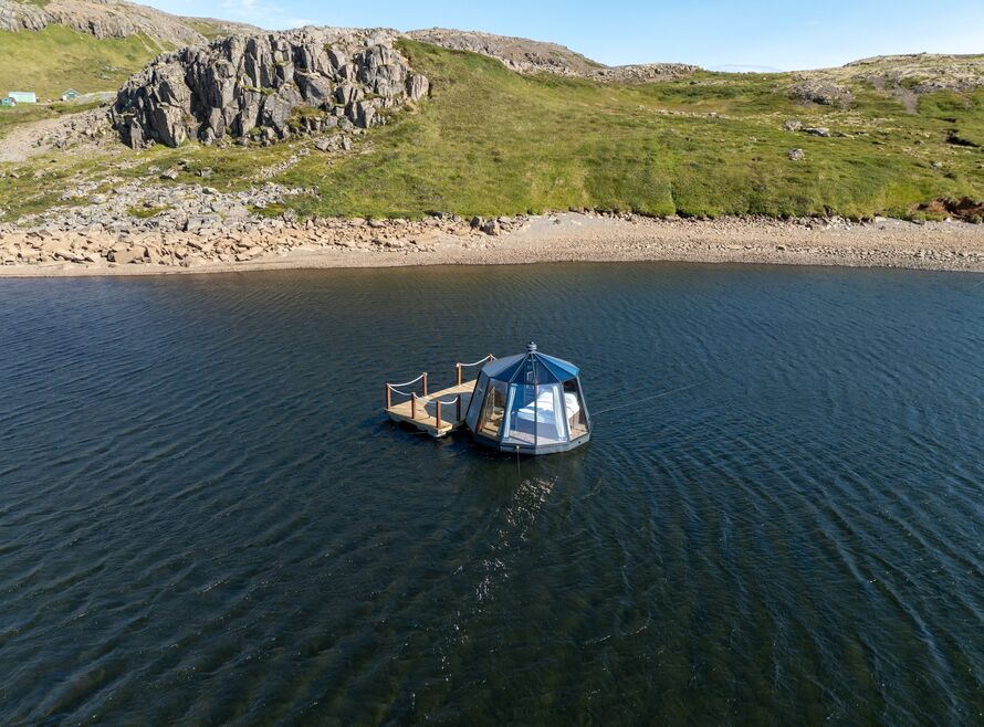 Floating glass igloo on a lake in Iceland