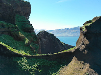 Couple sitting on island ridge