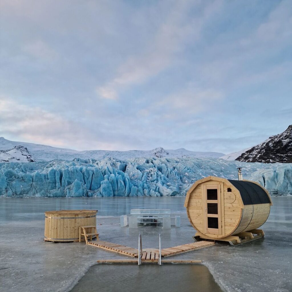 Plunge pool, hot tub and sauna on frozen lake