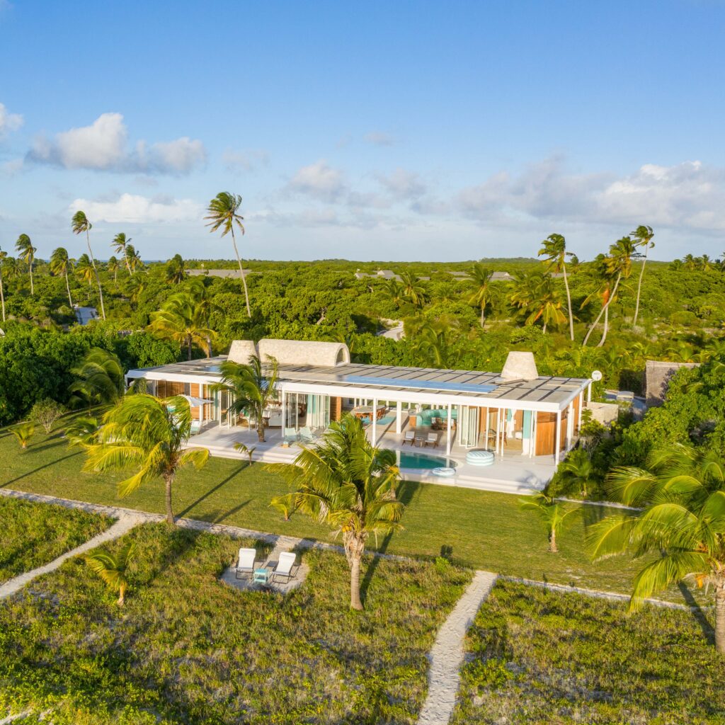 One of Miavana's villas surrounded by lush greenery.