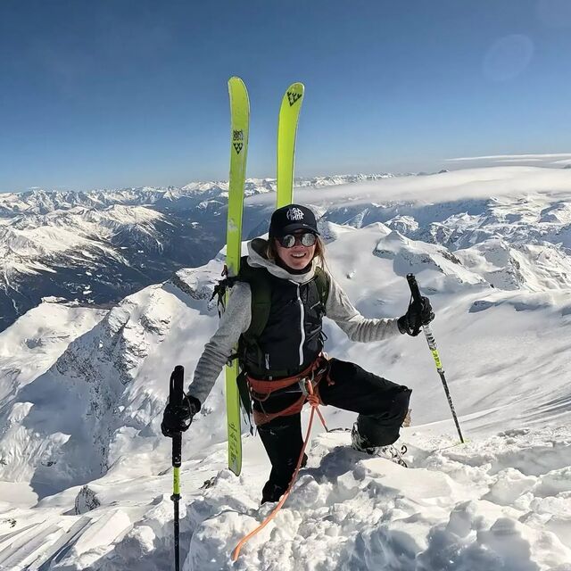 Olimpia Emo Capodilista at the top of a mountain with skis